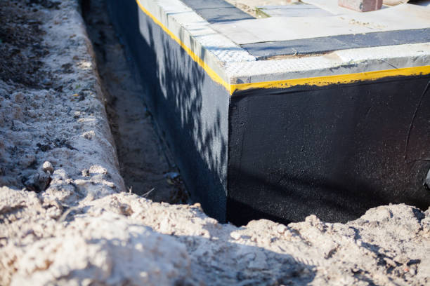 Professional Waterproofing technician working in Eagle, WI
